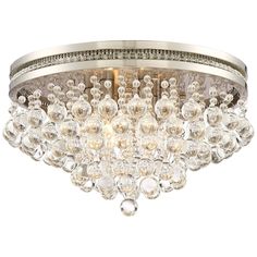 a flush light fixture with clear crystal balls