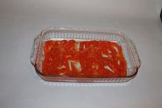 a plastic container filled with food sitting on top of a counter