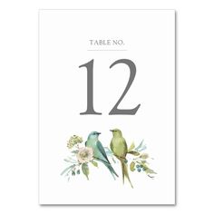 a table number card with two birds on it and flowers around the numbers 12 - 12