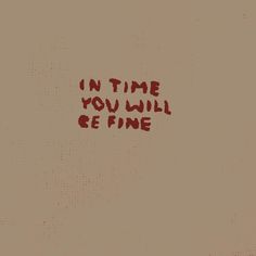 the words in time you will be fine are written on a brown paper with red ink