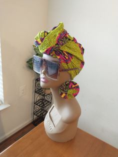 This Headwrap is 100 % cotton African Fabric. Could be wrapped or tied in different ways to achieve your preferred gorgeous look. So versatile you can use as a neck scarf, shawl or cover up sash. *Non Pre-tied*  Added matching earrings which is light weight and 3.2" other options earrings available Due to nature of Fabric pattern, Earrings pattern may differ from front and back.  But every item is so unique in itself. Measurement: "70-71" long, width 22" Earrings: "3.2" Care: Wash on gentle cycl Pink Headwrap, Gift Sets For Her, Frederick Md, Neck Scarf, Green And Pink, Earring Patterns, Fabric Pattern, African Fabric, Neck Scarves