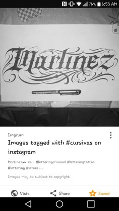 an instagram page with the word instagram on it and a pen in front of it