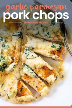 garlic parmesan pork chops on a white plate with spinach and cheese