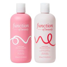 two different types of hair products on a white background, one is pink and the other is red