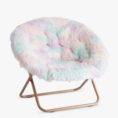 a pink and blue chair with metal legs on a white background, it is decorated with multi - colored fur