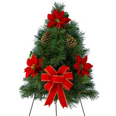 a small christmas tree with red bows and pine cones on it's top is shown in front of a white background