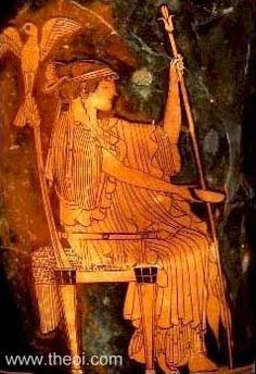 an ancient greek vase with a woman sitting on a chair and holding a staff in her hand