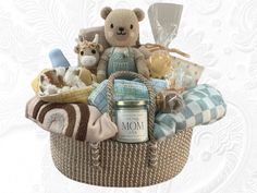 a teddy bear sitting on top of a basket filled with items