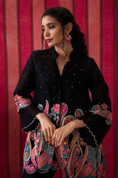 Black flared sleeves asymmetric cut work detailing top with paisley blossom applique and spluttered sequin embellishments detailing. Paired with a straight pant. - Aza Fashions Elegant Fitted Tops With Printed Motifs, Fitted Tops With Printed Motifs, Elegant Summer Tops With Printed Motifs, Eid Blouse With Embroidered Sleeves, Elegant Floral Print Top For Festive Occasions, Elegant Floral Print Top For Festive Season, Designer Tops With Printed Motifs, Elegant Fitted Blouse With Printed Motifs, Elegant Blouse With Printed Motifs