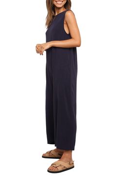 A back cutout adds to the breezy design of this linen-kissed jumpsuit fashioned with roomy legs. Pull-on style Bateau neck Sleeveless Side-seam pockets 70% rayon, 30% linen Hand wash, dry flat Imported Hawaii Rainy Day Outfit, Solid Color Sleeveless Relaxed Fit Jumpsuit, Cotton Sleeveless Jumpsuits And Rompers For Loungewear, Sleeveless Cotton Jumpsuits And Rompers For Loungewear, Cotton Sleeveless Jumpsuits And Rompers For Daywear, Sleeveless Cotton Jumpsuits And Rompers For Daywear, Sleeveless Cotton Jumpsuit For Daywear, Cotton Sleeveless Jumpsuit For Daywear, Relaxed Fit Sleeveless Jumpsuits For Loungewear