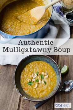 authentic mulligra tawny soup in a blue bowl with a wooden spoon on the side