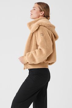 Done in plush sherpa, the Foxy is your new go-to layer. It has a removable hood, a tall collar, a front zipper and cozy ribbing at the cuffs and hem. Fitwise, it’s relaxed with a hip-length hem. Wear it with a cute skirt on the weekend, with sneakers to catch a flight, or over a matching set to walk to your workout. Seriously—it’s that versatile. Alo Yoga Winter Outerwear With Ribbed Cuffs, Alo Yoga Hooded Outerwear With Drawstring, Alo Yoga Hooded Outerwear With Ribbed Cuffs, Hooded Alo Yoga Outerwear With Ribbed Cuffs, Alo Yoga Hooded Outerwear For Winter, Alo Yoga Fall Outerwear With Drawstring Hood, Alo Yoga Outerwear With Drawstring Hood For Fall, Alo Yoga Drawstring Hood Outerwear For Fall, Alo Yoga Cozy Long Sleeve Outerwear