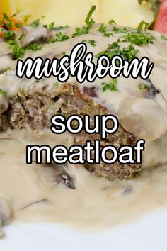 mushroom soup meatloaf with mushrooms and parsley on top, served over mashed potatoes