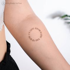 a woman's arm with a tattoo that says, love is in the air