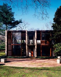 the building is made out of concrete and has many windows