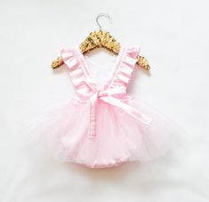 How GORGEOUS is our sequin romper! These rompers are perfect for any special occasion, first birthday, cake smash, holidays, etc. Handmade in Southern California with 100% designer cotton fabrics. All edges and seams have been serged for a professional finish! For best results, hand wash and lay flat to dry on all items that have any special trim, iron on decal or tulle . If it doesn't have any of those items feel free to wash in cold water on delicate cycle, tumble dry low heat or lay flat to d Cinderella Birthday Party Decorations, Faerie Costume, Romper Sewing Pattern, Mommy Daughter Outfits, 1st Birthday Dresses, Dress Tutu, London Poster, Flower Girl Dresses Tutu, Sequin Rompers