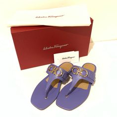 Brand New In Box With Dustbag Salvatore Ferragamo Size 6.5 Rikis Leather Calfskin Gancini Thong Sandal Color: Bleached Blue (Periwinkle Color) Fits True To Size Thong Slip On Gancini Logo Hardware At Instep 0.4" Heel Calf Leather Upper, Goat Leather Lining, Leather Sole Made In Italy Elegant Purple Sandals With Buckle Closure, Designer Purple Open Toe Sandals, Designer Purple Sandals For Summer, Luxury Round Toe Purple Sandals, Luxury Purple Sandals With Round Toe, Luxury Purple Round Toe Sandals, Purple Flat Leather Sandals, Designer Purple Sandals For Formal Occasions, Purple Leather Sandals With Buckle Closure