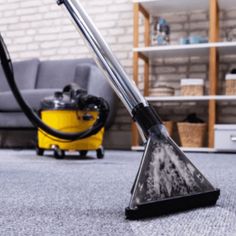 a carpet cleaning machine is on the floor