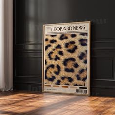 a leopard print is on the floor next to a window