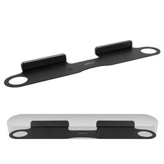 two black and white objects are shown on a white background, one has a pair of scissors in it