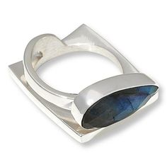 Jay King Gallery Collection Sterling Silver Labradorite Ring  A shimmering labradorite stone from Madagascar set atop a contemporary-style silver base, lends an elegant, exotic look to this unique, handcrafted ring. From Jay's exclusive Gallery Collection.       Approx. 1/2"L x 3/4"W x 5/16"H; shank 5/16"W     Stamped .925     Contemporary-style ring has oblong, pear-shaped, faceted labradorite stone bezel-set horizontally atop square-shaped band   Stone Information       All sizes and weights approximate     Stabilized Labradorite - Faceted pear (18x8mm); mined in Madagascar Modern Open Moonstone Ring For Anniversary, Modern Moonstone Open Ring For Anniversary, Modern Moonstone Ring With Large Stone, Modern Jewelry With Large Stone Open Ring, Modern Moonstone Ring For Anniversary, Modern Silver Moonstone Ring With Polished Finish, Modern Open Ring With Large Stone, Modern Moonstone Ring With Large Stone As Gift, Modern Moonstone Ring With Large Stone For Gift