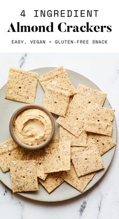 an image of crackers on a plate with the text 4 ingredient almond crackers