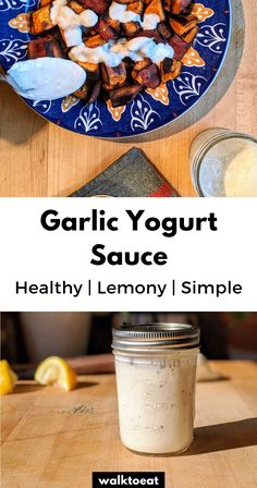 garlic yogurt sauce in a mason jar on a wooden table with lemons