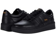 Gola Grandslam Leather - Women's Shoes : Black/Black : The Gola Grandslam Leather sneaker keeps true to its court heritage with its sleek lines and sporty silhouette. All leather uppers. Lace-up closure for a secure fit. Padded collar and tongue. Soft textile linings. Padded footbed for optimal comfort. Durable gum rubber outsole. Imported. Measurements: Weight: 12 oz Product measurements were taken using size 8, width B - Medium. Please note that measurements may vary by size. Weight of footwea Tennis Sneakers With Vulcanized Sole Lace-up, Lace-up Tennis Sneakers With Vulcanized Sole, Low-top Tennis Sneakers With Rubber Sole, Tennis Sneakers With Rubber Sole, Low-top, Tennis Sneakers With Round Toe And Rubber Sole, Tennis Sneakers With Rubber Sole And Round Toe, Tennis Sneakers With Gum Sole And Round Toe, Leather Product, Black Shoes Women