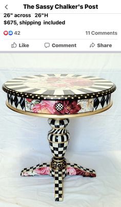 a table that has been decorated with black and white checkerboard designs on it