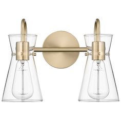 two light brass bathroom fixture with clear glass shades and gold metal fittings on the wall