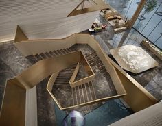 an aerial view of a spiral staircase in a building