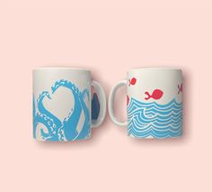 two coffee mugs with different designs on them