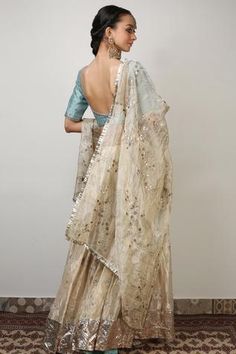 Shop for Rhua India Gold Banarasi Tissue Floral Embroidered Lehenga Set for Women Online at Aza Fashions Lehenga Banarasi, Banarasi Blouse, Gold Lehenga, Light Blue Blouse, Zardozi Embroidery, Embroidered Lehenga, Scoop Neck Blouses, Floral Set, Silk Dupatta