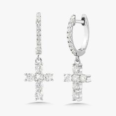 Our Adalia Cross Huggies are a twinkling token of faith. An ideal pair of huggies to dress up, down, or wear daily. Metal: 18k White Gold / 18k Yellow Gold / 18k Rose Gold Approx. 0.62 ctw G/H Color and SI1-2 Clarity Diamonds Cross size 7.45mm width x 9.5mm height Huggie Diameter: Approx. 10mm Closure: Hinge Diamond Halo Huggie Earrings, Diamond Huggie Earrings With Halo, Luxury White Huggie Earrings For Wedding, Luxury Halo Huggie Earrings, White Huggie Earrings With Brilliant Cut, White Brilliant Cut Huggie Earrings, Hallmarked Huggie Earrings For Wedding, Luxury White Gold Huggie Earrings With Halo Design, White Diamond Cut Huggie Earrings