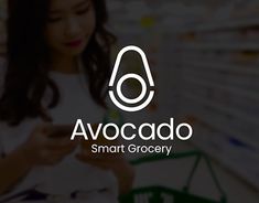 a woman looking at her cell phone while shopping in a grocery store with the words avocado smart grocery