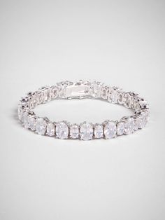 Traditional tennis bracelet styling gets an elegant update thanks to gorgeous oval crystals in varying sizes. Style Me Pretty + BaubleBar Bracelet Styling, Necklaces Statement, Shop Jewelry, Pretty Bracelets, Diamond Bangle, Girly Jewelry, Chic Fashion, Tennis Bracelet