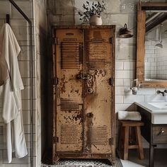 a rusted metal cabinet in a bathroom next to a sink