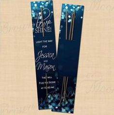 two bookmarks with blue sparkles on them and the words love shine in white