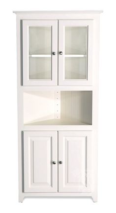 a white cabinet with glass doors and drawers