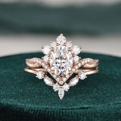 a diamond ring on top of a velvet cushion