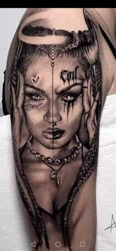 a woman's face with tattoos on her arm