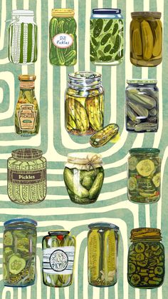 several jars filled with pickles and cucumbers on top of a striped background