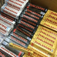 many boxes of toblerone are stacked on top of each other