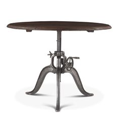 an old fashioned table with two wheels on the top and one wheel on the bottom