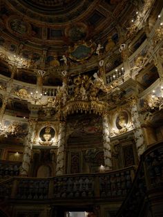 an ornately decorated ceiling in a building