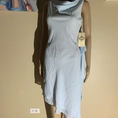 Dollar Size Xs Dress Length 36/44” Poly With Scarf Blue Light Blue Fitted Silk Dress, Fitted Sleeveless Light Blue Midi Dress, Fitted Silk Casual Dresses, Light Blue Sheath Midi Dress For Summer, Casual Fitted Silk Dresses, Casual Silk Knee-length Midi Dress, Casual Knee-length Silk Midi Dress, Summer Light Blue Sheath Midi Dress, Casual Silk Midi Dress