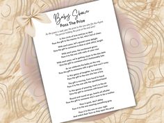 a poem written in white paper with a bow on it