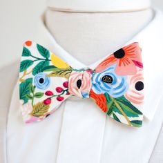 "Dapper Men's Garden Party In Cream Freestyle Self-Tie Bow Tie Made By The Belle And The Beau! ♥ This beautiful cotton floral fabric is part of our new Wildwood Collection designed by Rifle Paper Co! We have been approved by Rifle Paper Co to make our products in these fabrics- that means we will be ordering bolts regularly! Yay! Our extraordinary, modern, and stylish freestyle self-tie bow ties are perfect for everyday, Sunday best, all special occasions, photography sessions, and especially da White Bow Tie For Spring, Spring Adjustable Bow Tie, Elegant Spring Bow Tie For Gift, Elegant Spring Bow Tie As A Gift, Bowties Men's, Pre Tied Bow Tie, Boys Bow Ties, Wedding Order, Dapper Men