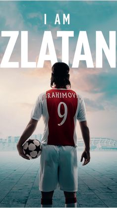 a man holding a soccer ball on top of a poster with the words i am zlatan