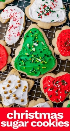 christmas sugar cookies decorated with icing and sprinkles on a cooling rack